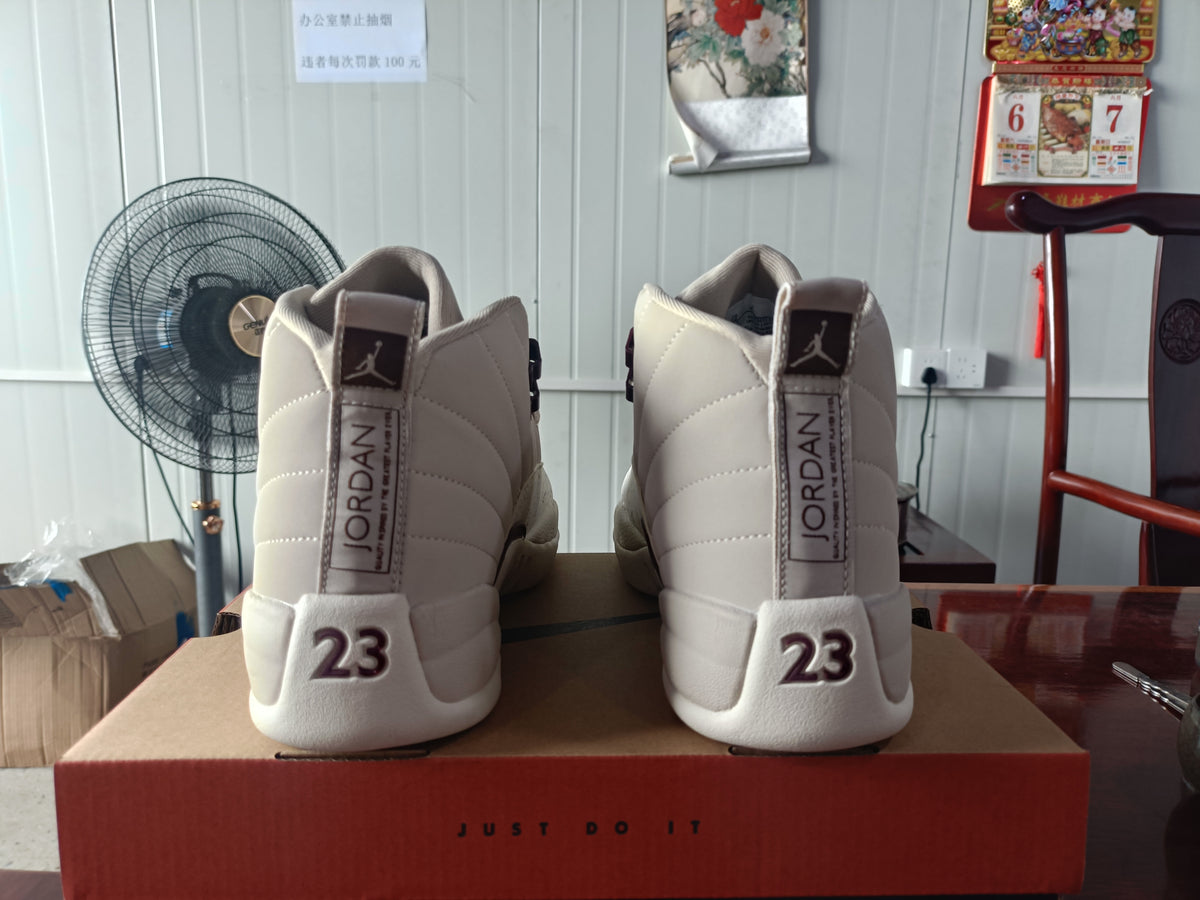 Air Jordan 12 Light Gray Sneakers with Speckled White Panels