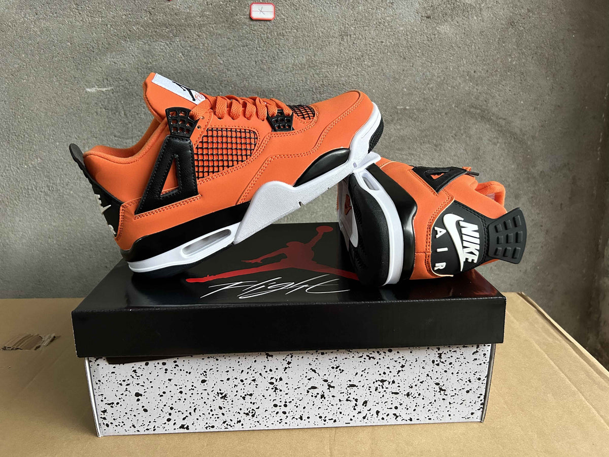 Air Jordan 4 Sneakers – Orange & Black