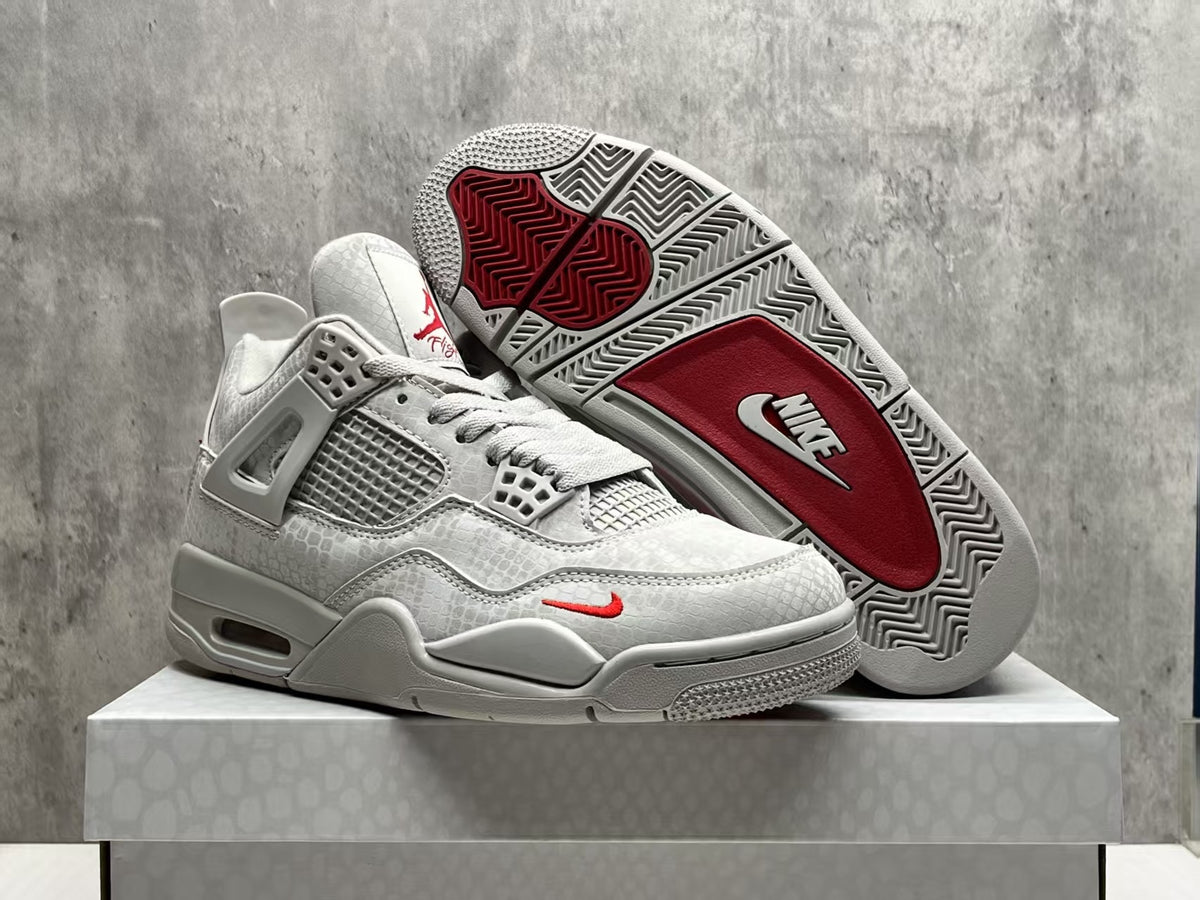 Nigel Sylvester x Air Jordan 4 Gray Sneakers with Red Accents