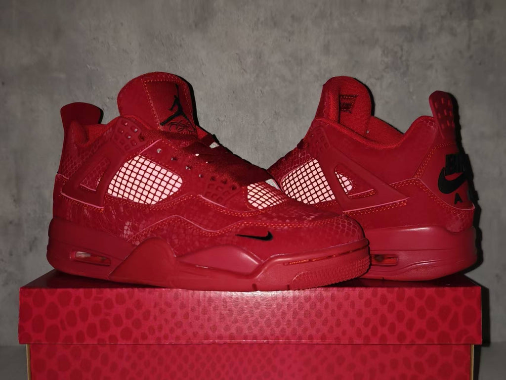 Nigel Sylvester x Air Jordan 4 Red Sneakers with Black Accents
