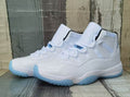 Air Jordan 11 White High-Top Sneakers with Icy Blue Soles