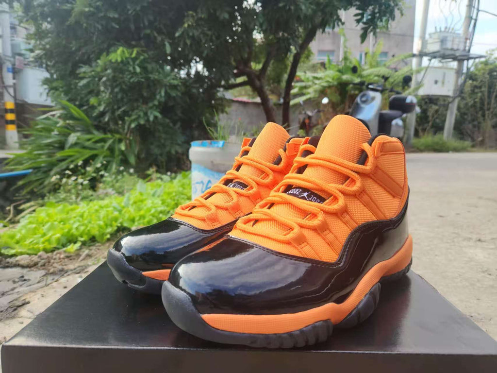 Air Jordan 11 Retro Orange & Black High-Top Sneakers