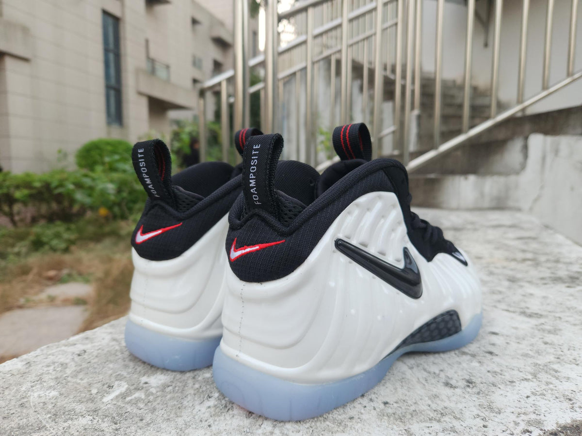 Nike Foamposite White & Black Sneakers with Icy Blue Soles