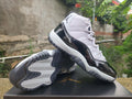 Air Jordan 11 Black & White High-Top Sneakers