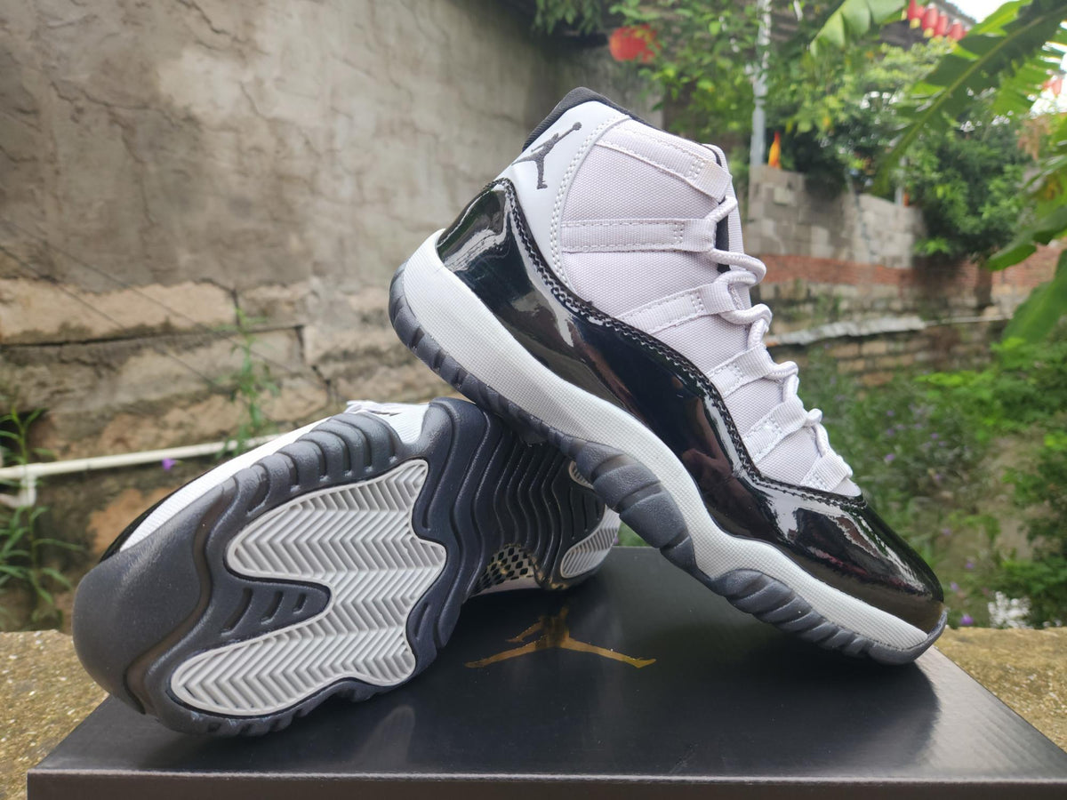 Air Jordan 11 Black & White High-Top Sneakers