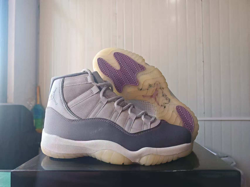 Air Jordan 11 Gray High-Top Sneakers with Purple Sole Details