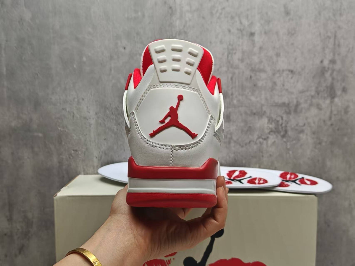 Air Jordan 4 Retro White & Red Sneakers