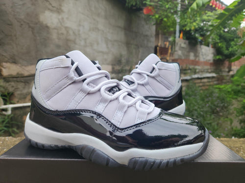 Air Jordan 11 Black & White High-Top Sneakers
