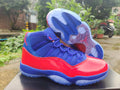 Air Jordan 11 High-Top Sneakers – Red & Royal Blue