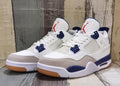 Air Jordan 4 Retro White & Navy Blue Sneakers