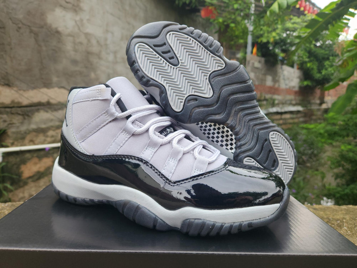 Air Jordan 11 Black & White High-Top Sneakers