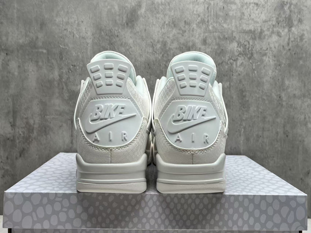Air Jordan 4 Retro Triple White Sneakers