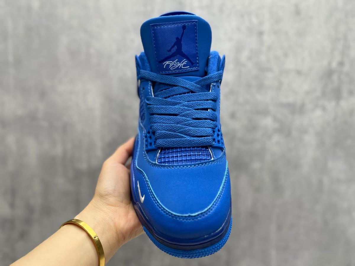 Air Jordan 4 Retro Royal Blue & White Sneakers