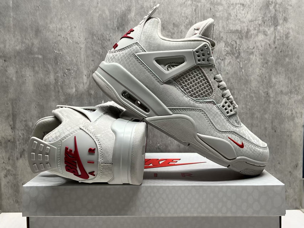 Nigel Sylvester x Air Jordan 4 Gray Sneakers with Red Accents