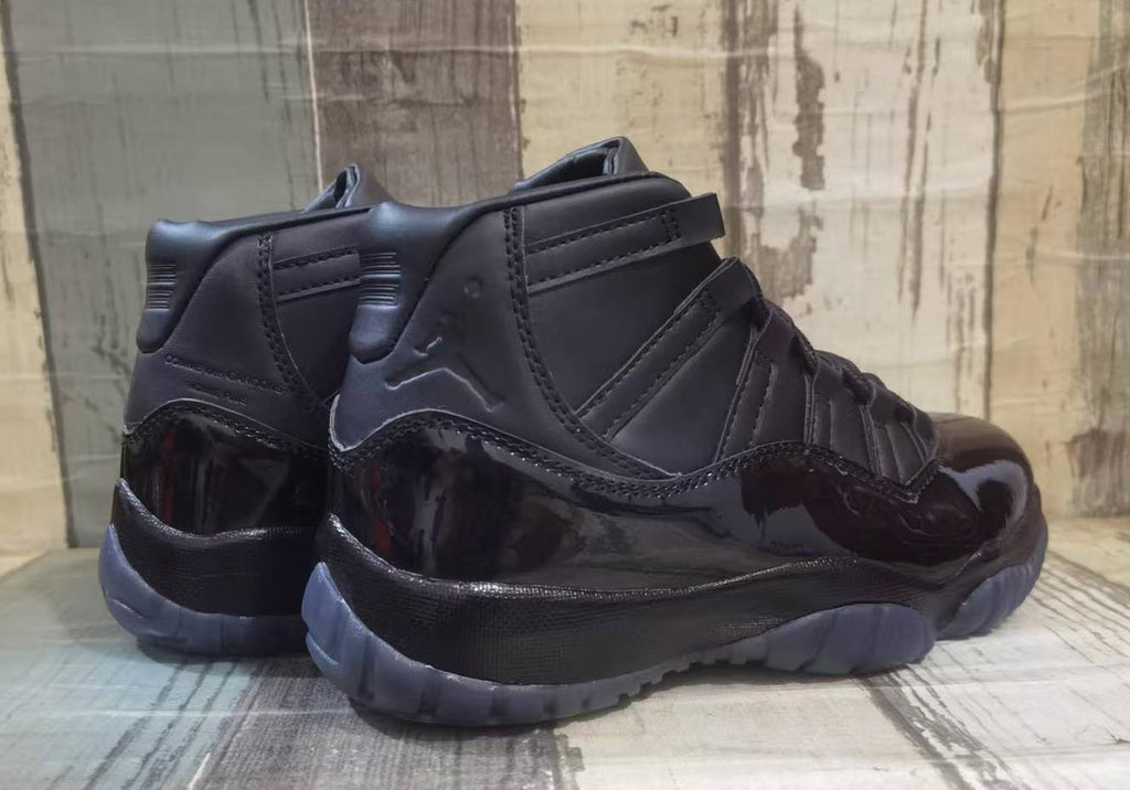 Air Jordan 11 Black High-Top Sneakers with Glossy Overlays