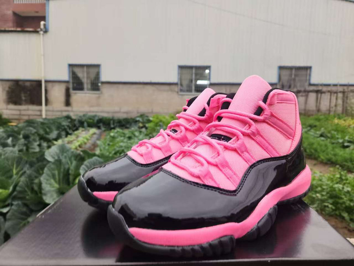 Air Jordan 11 Retro Black & Pink High-Top Sneakers