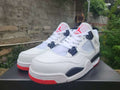 Air Jordan 4 Retro White, Black & Red Sneakers