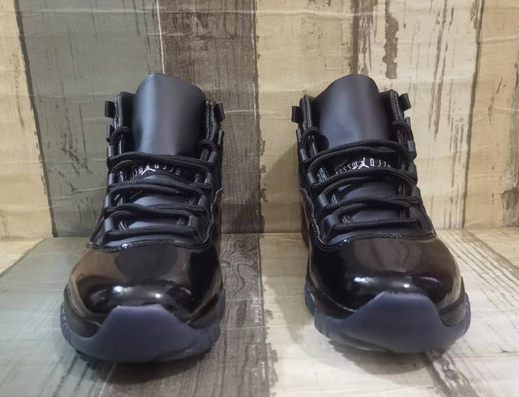 Air Jordan 11 Black High-Top Sneakers with Glossy Overlays