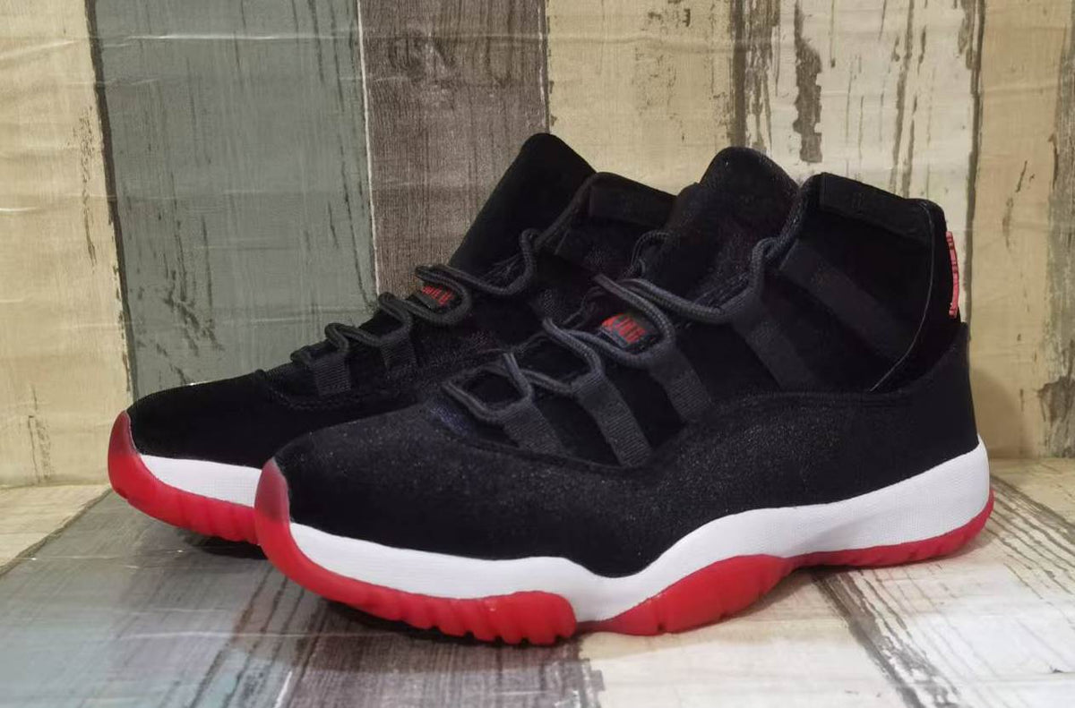 Air Jordan 11 Black & Red High-Top Sneakers with White Midsoles