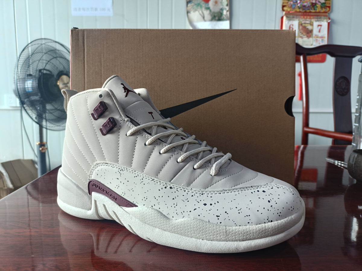 Air Jordan 12 Light Gray Sneakers with Speckled White Panels