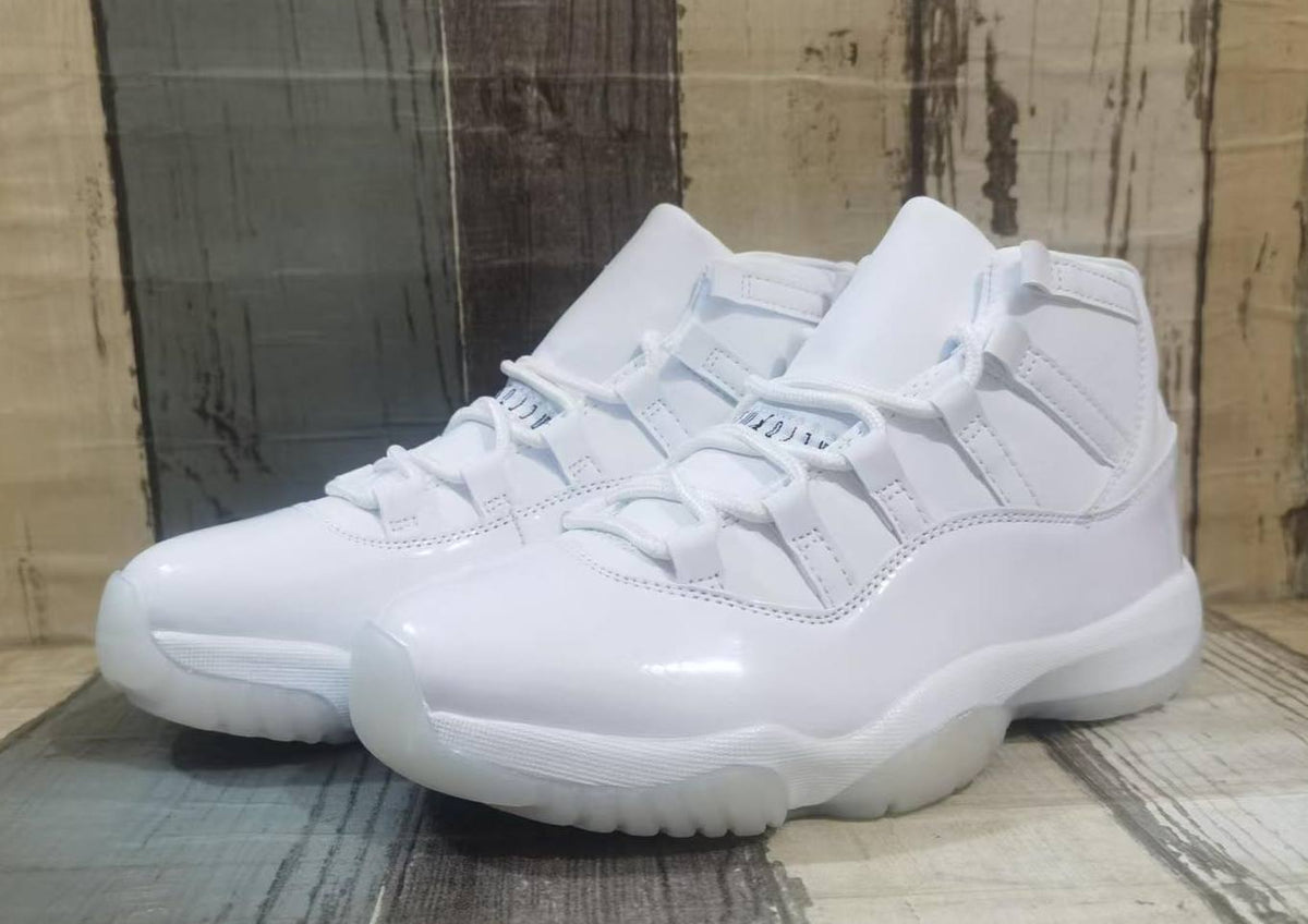 Air Jordan 11 White High-Top Sneakers with Glossy Overlays