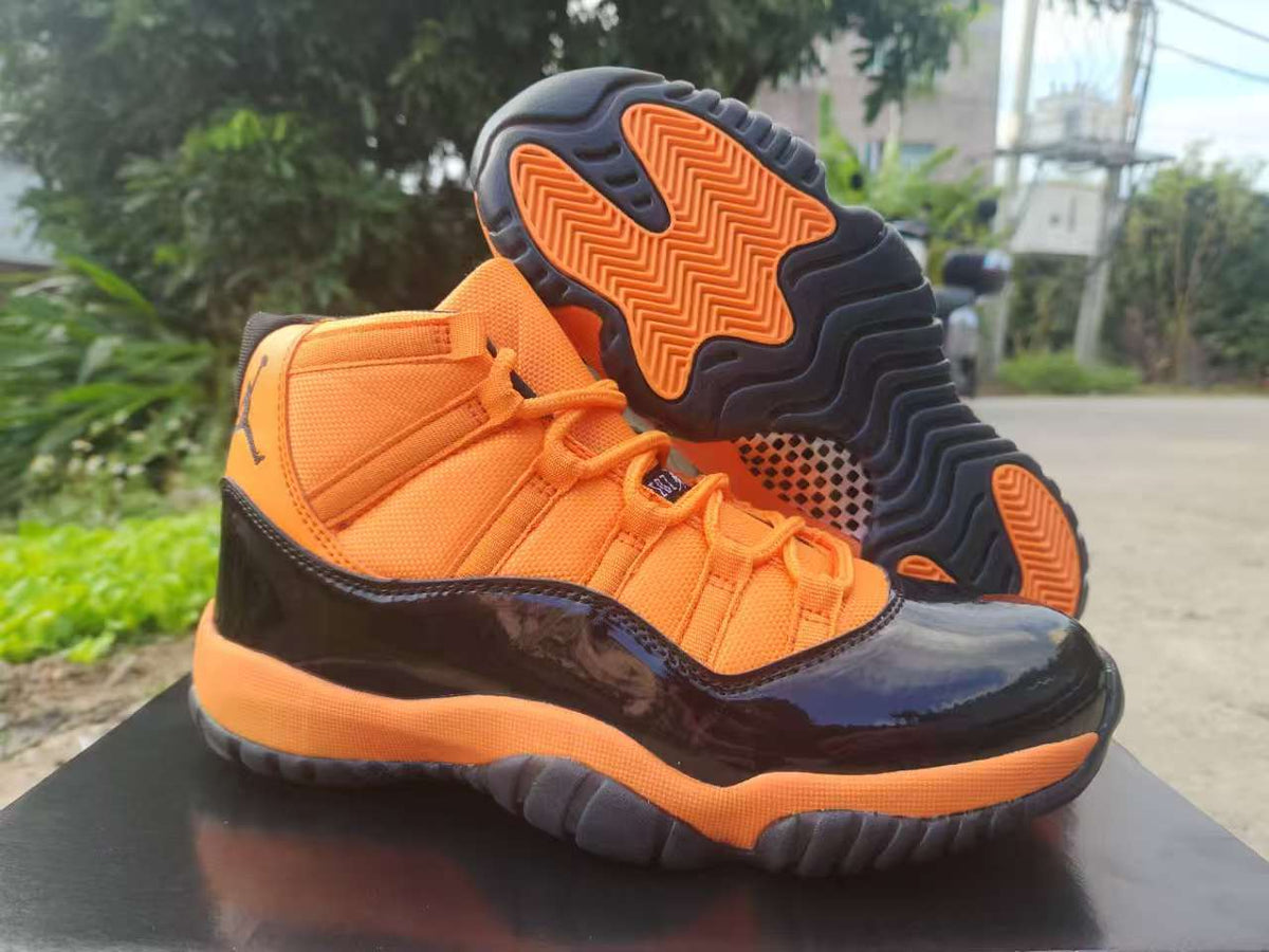 Air Jordan 11 Retro Orange & Black High-Top Sneakers