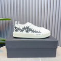 AMIRI White Low-Top Sneakers with Black Stars