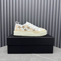 AMIRI White & Cream Low-Top Sneakers with Beige & Bronze-Tone Stars