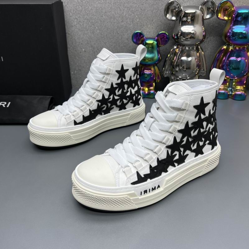 AMIRI White High-Top Sneakers with Black Star Details
