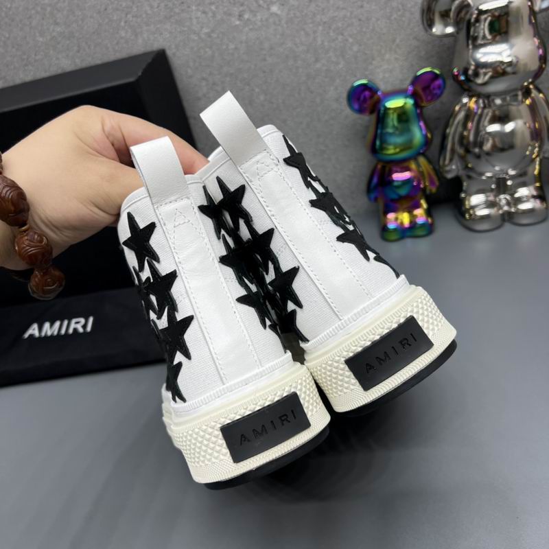 AMIRI White High-Top Sneakers with Black Star Details