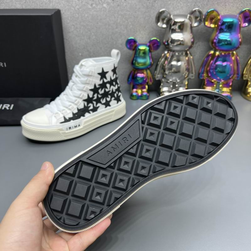 AMIRI White High-Top Sneakers with Black Star Details