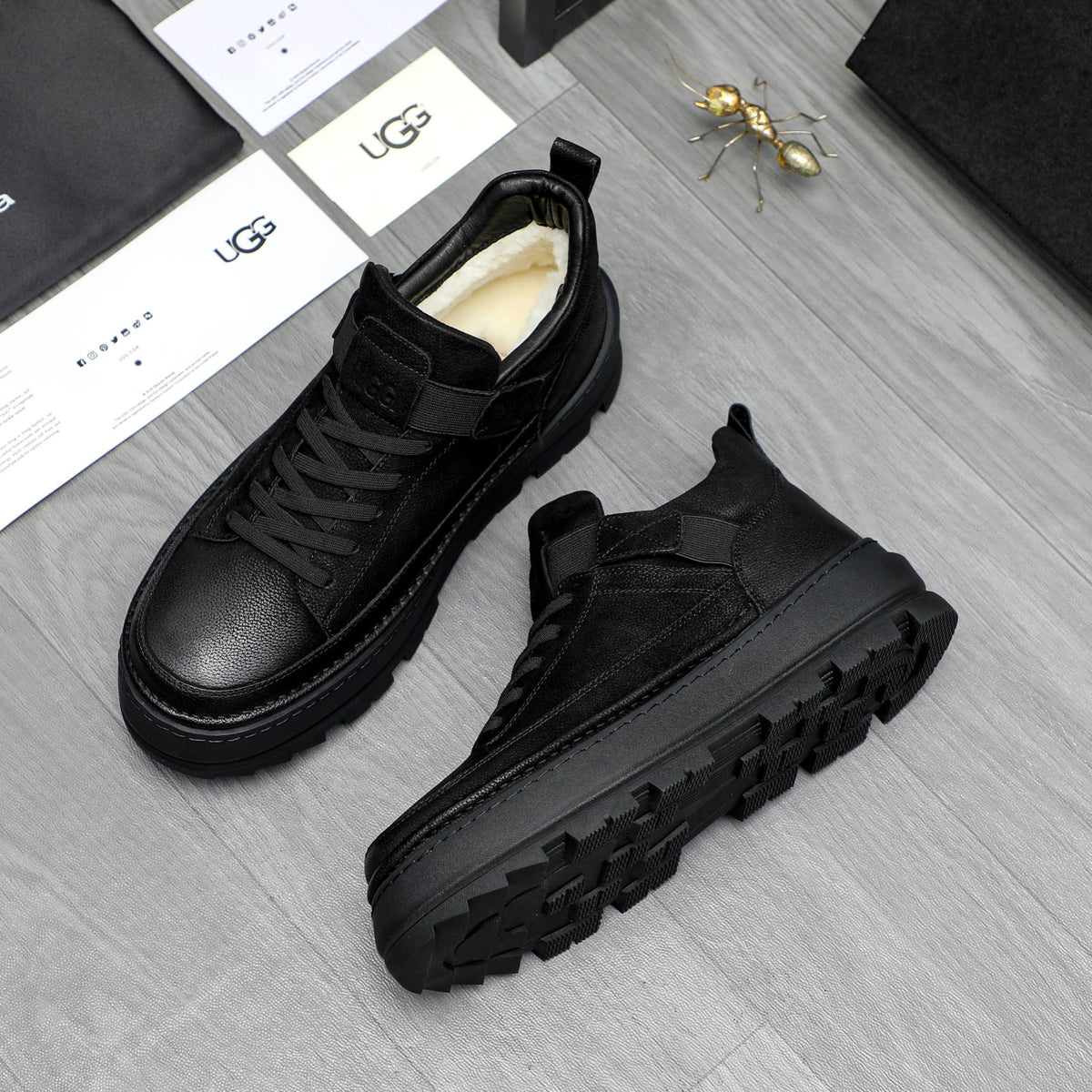 UGG Black Strap-Detail Lug-Sole Ankle Boots