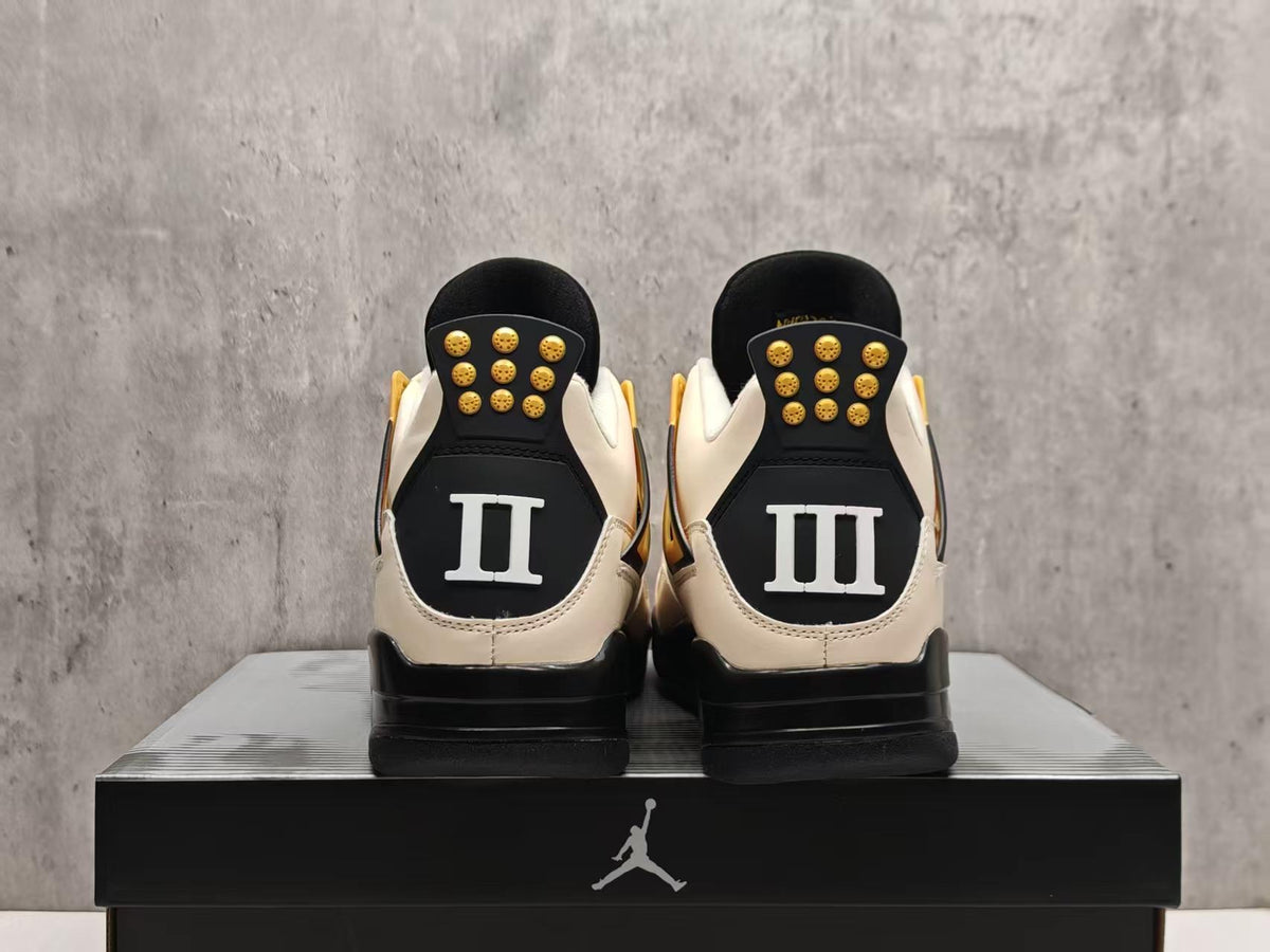 Air Jordan 4 Cream & Black Sneakers with Gold-Tone Details