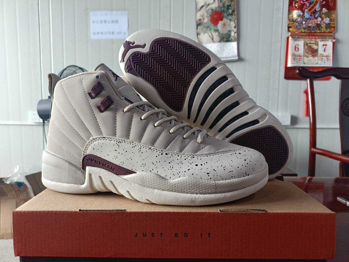 Air Jordan 12 Light Gray Sneakers with Speckled White Panels