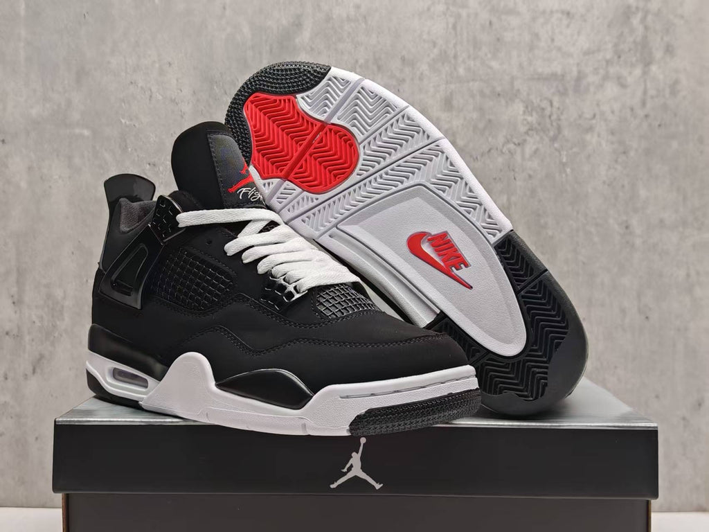 Air Jordan 4 Black & White Sneakers with Red Accents