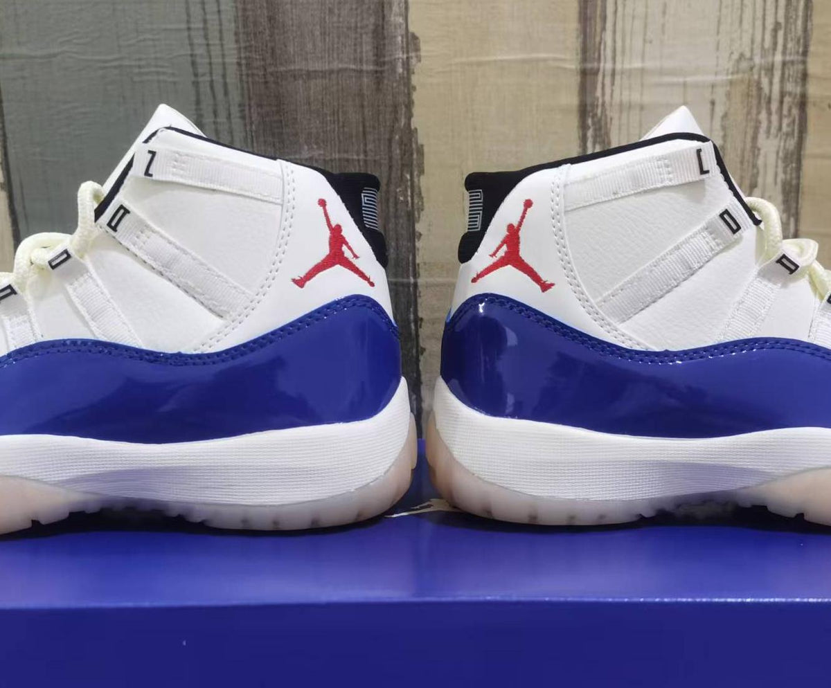 Air Jordan 11 Retro Sail & Deep Royal Blue High-Top Sneakers