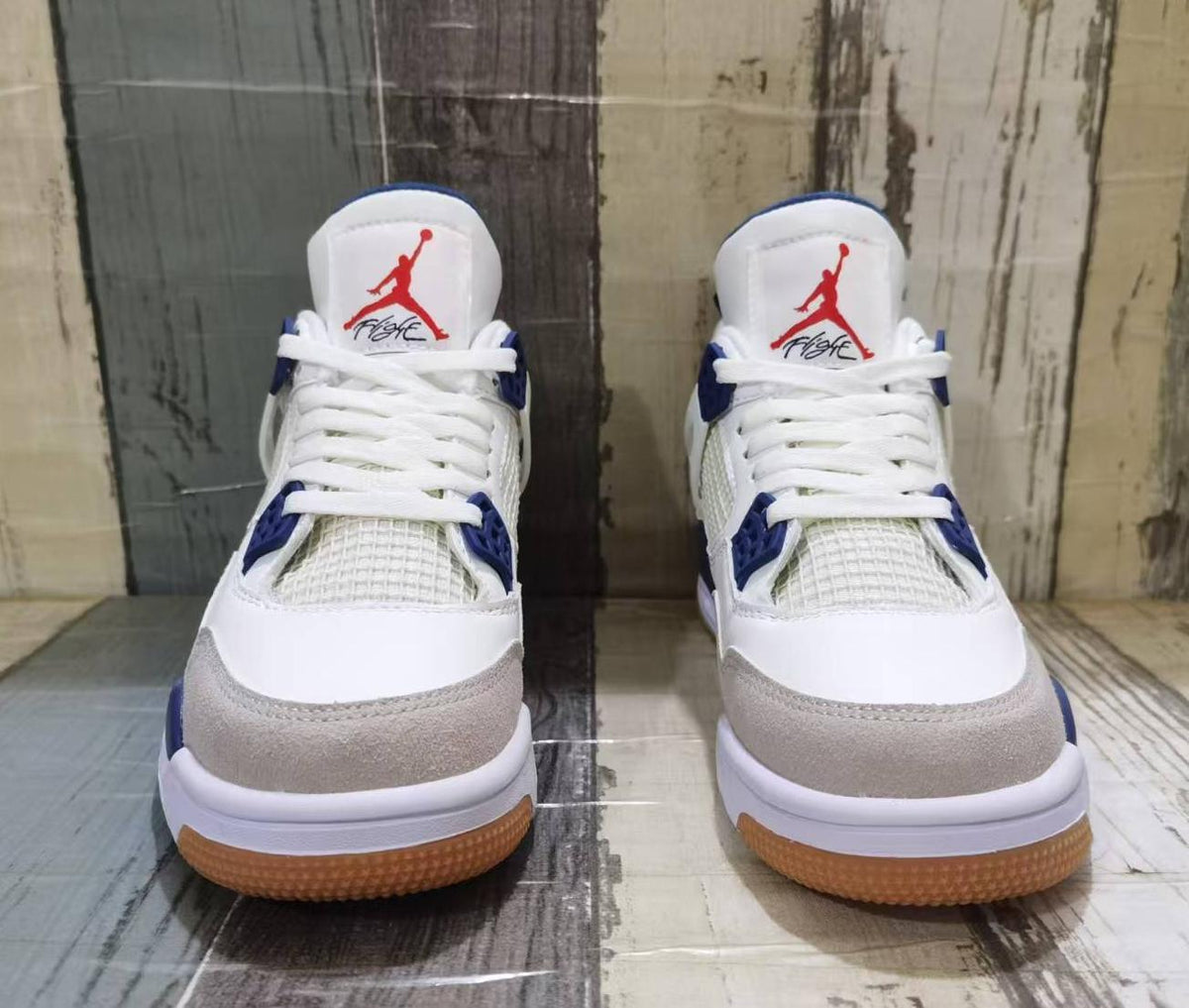 Air Jordan 4 Retro White & Navy Blue Sneakers