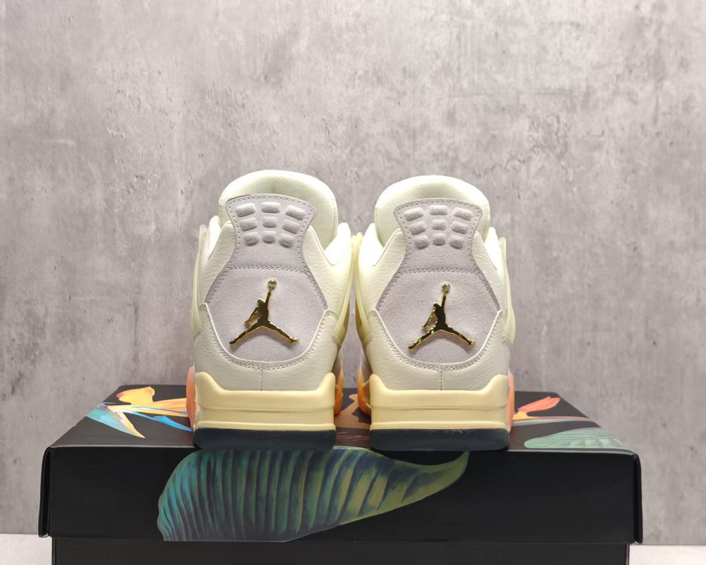 Air Jordan 4 Cream & Grey Sneakers with Orange Accents