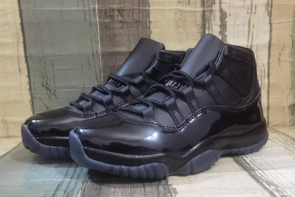 Air Jordan 11 Black High-Top Sneakers with Glossy Overlays